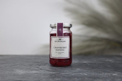Produktfoto des Glases mit Cranberry-Kandis von L.W.C. Michelsen für ein fruchtiges Geschmackserlebnis im Tee.