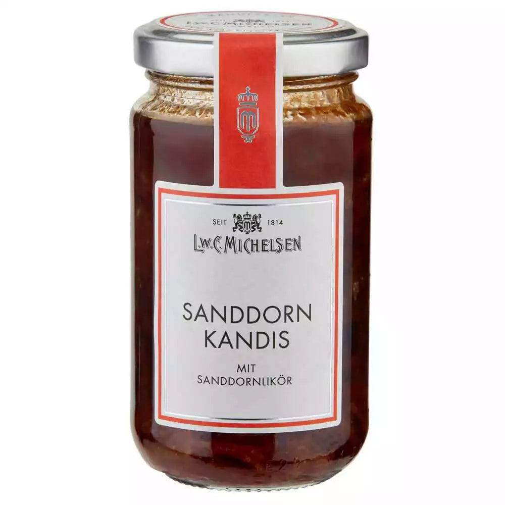 Glas "Sanddorn Kandis mit Sanddornlikör" von L.W.C. Michelsen mit silbernem Deckel und rotem Etikett