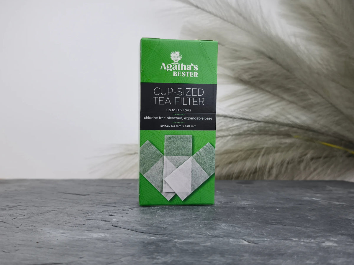 Produktfoto der Verpackung mit Teefiltern für Tassen, Papierfilter ohne Halter, bis zu 0,3 Liter, chlorfrei gebleicht.