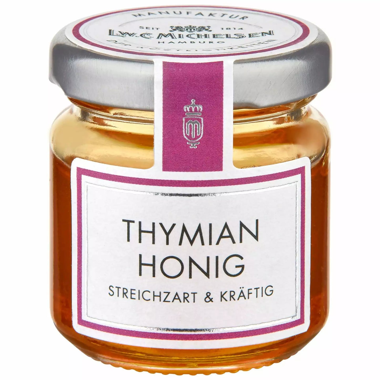Thymian Honig im Glas von L.W.C. Michelsen mit Etikett streichzart und kräftig auf weißem Hintergrund