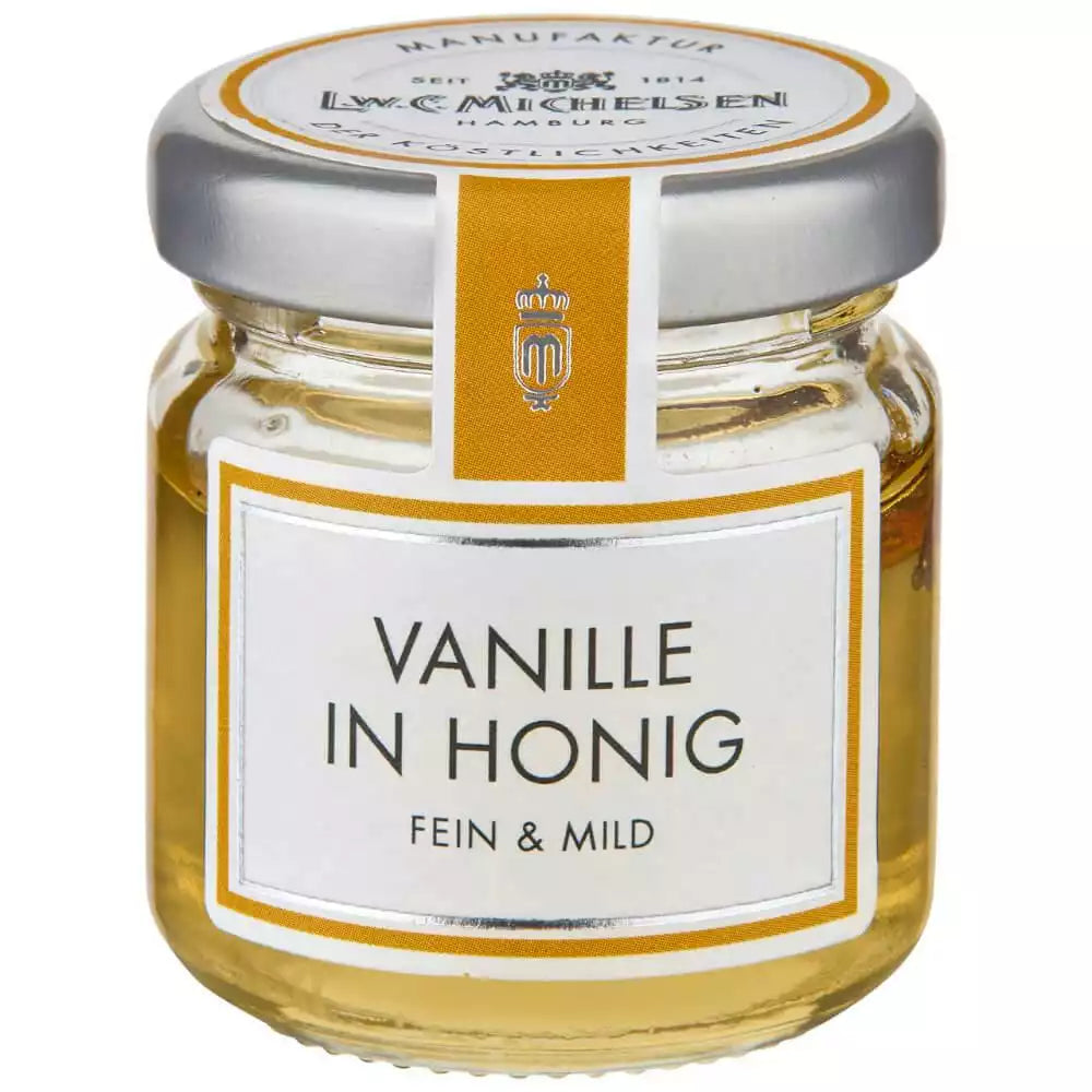 Vanille in Honig im Glas von L.W.C. Michelsen mit Etikett fein und mild auf weißem Hintergrund